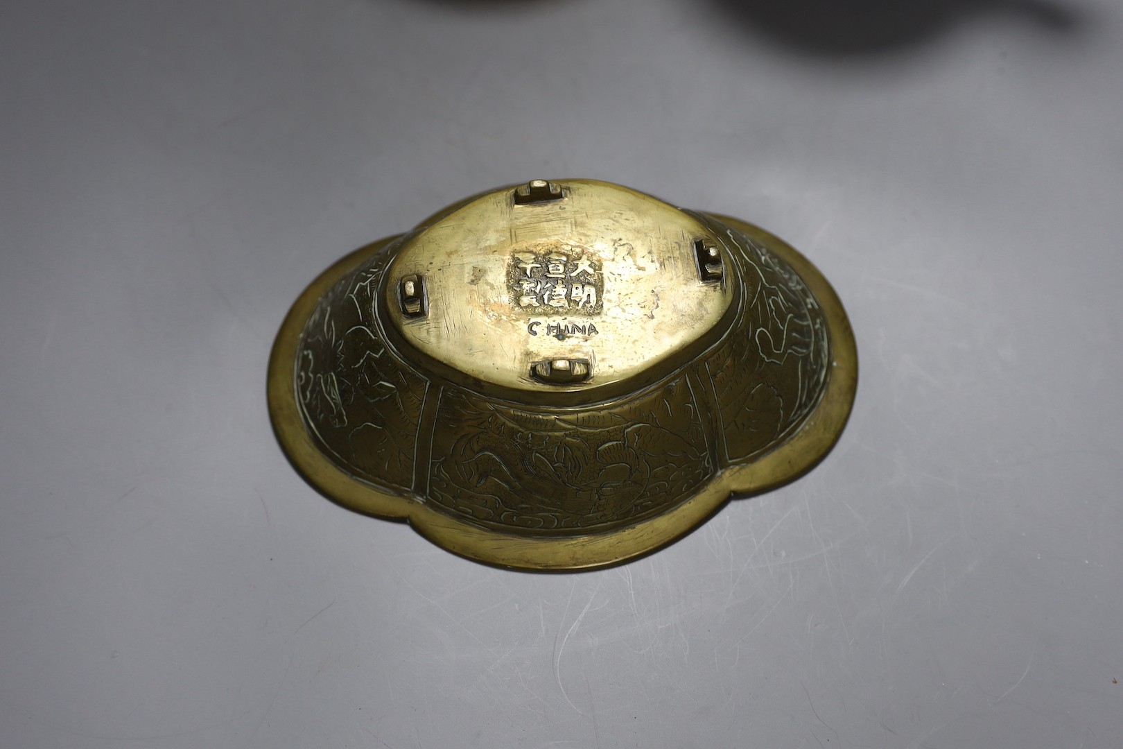 A Chinese built metal Buddha - 29cm high, a bronze Chinese lobed dish, together with a Tibetan teapot